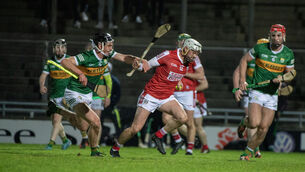 <p>Kerry's Cillian Trant Kerry and Cormac Beausang of Cork during the game which was played under lights in Tralee. Picture: Domnick Walsh © Eye Focus LTD </p>