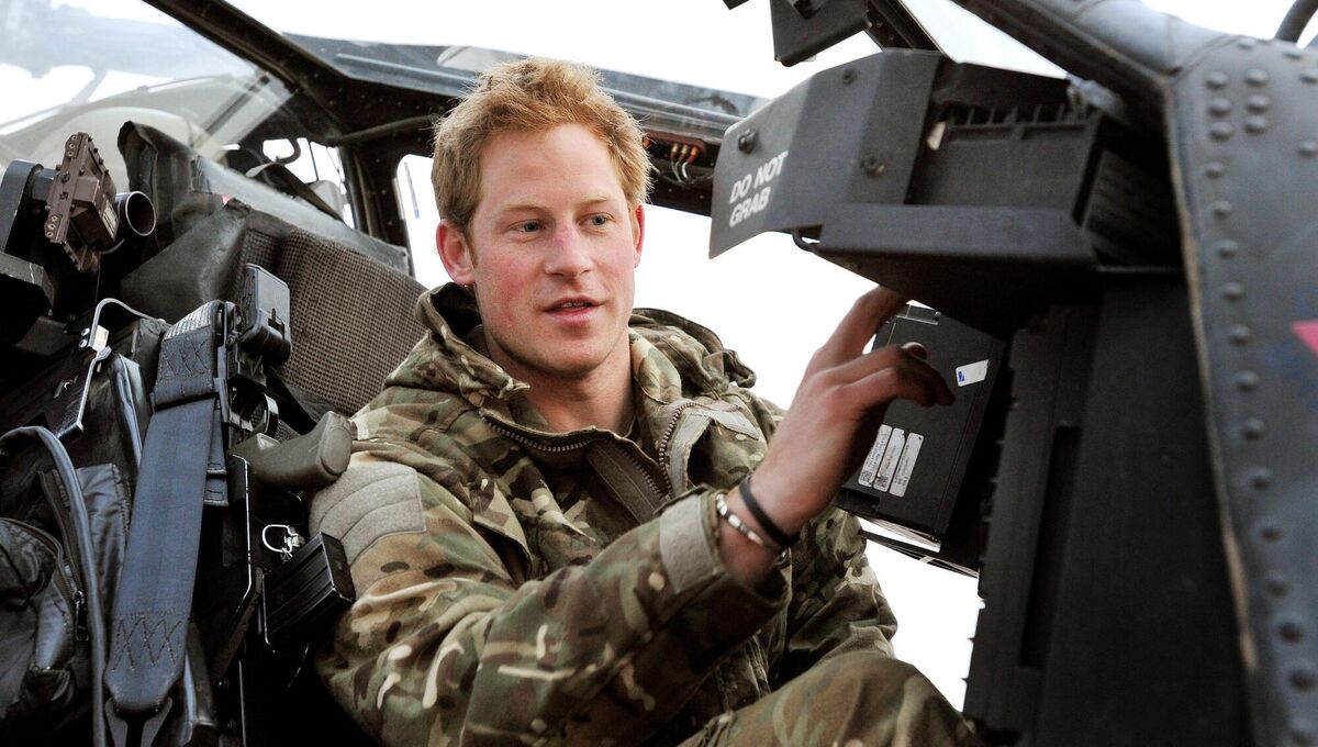 Prince Harry or just plain Captain Wales as he is known in the British Army, makes his early morning pre-flight checks in the cockpit on the flight-line, at Camp Bastion southern Afghanistan, where he is serving as an Apache Helicopter Pilot/Gunner with 662 Sqd Army Air Corps, from September 2012 for four months until January 2013.
