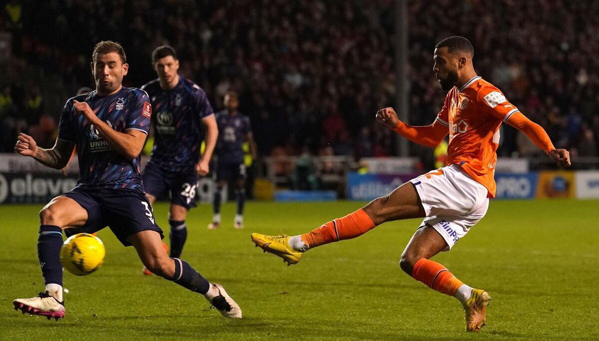 FOREST FELLED: Blackpool's CJ Hamilton scores their side's third goal of the game during the Emirates FA Cup third round match at Bloomfield Road, Blackpool. Pic: Martin Rickett/PA Wire.