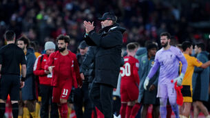 <p>HANGING IN: Liverpool manager Jurgen Klopp applauds the fans (Peter Byrne/PA)</p>
