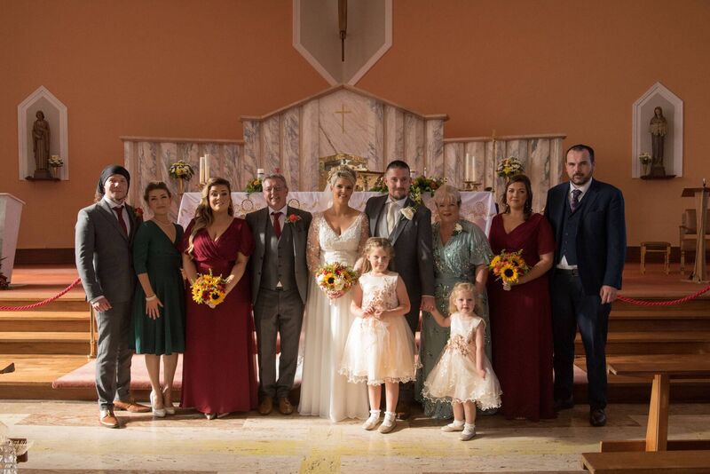 Rachel and Trevor and their daughters Emily-Belle and Katie-Rose with the groom's family