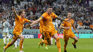 <p>UNITED-BOUND: Wout Weghorst of the Netherlands, center, celebrates after scoring his side's second goal during the World Cup quarterfina. Pic: AP Photo/Ricardo Mazalan.</p>