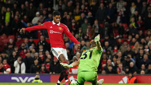 <p>ON SONG: Manchester United's Marcus Rashford scores their side's second goal of the game. Picture: Martin Rickett/PA Wire.</p>