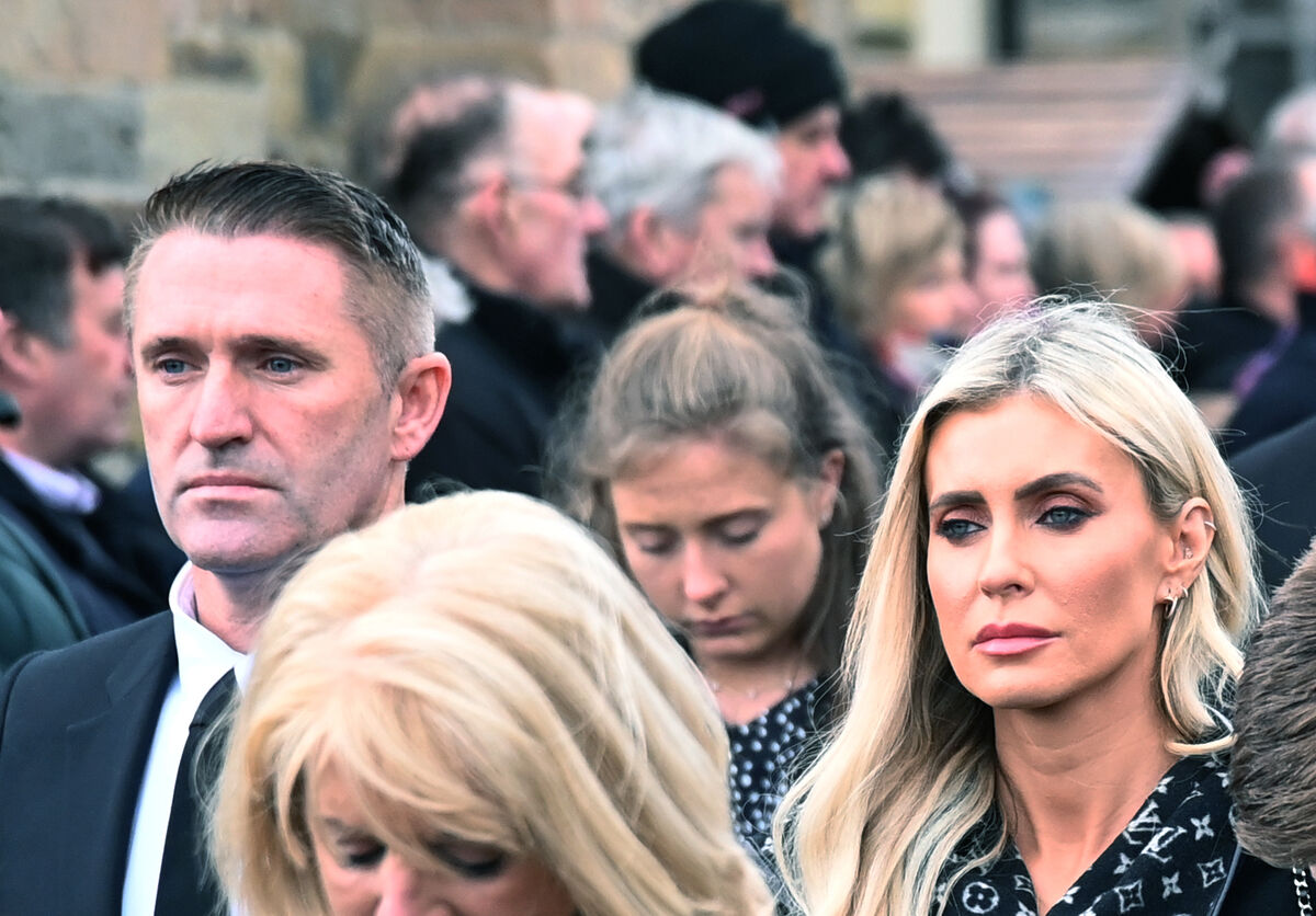 Claudine Keane, niece of Paudie Palmer, and her husband Robbie Keane at the funeral of Paudie Palmer, the C103 and 96FM broadcaster and The Echo columnist, at St. Mary's Church, Innishannon. Picture: Denis Minihane