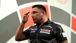 Gerwyn Price is still unsure about whether he will return to play in the World Darts Championship (Zac Goodwin/PA)