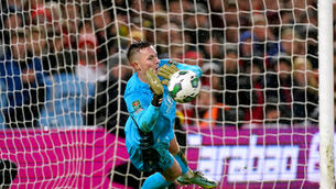 Dean Henderson saves from Wolves’ Joe Hodge in the penalty shoot-out to send Forest into the Carabao Cup semi-finals (Mike Egerton/PA)