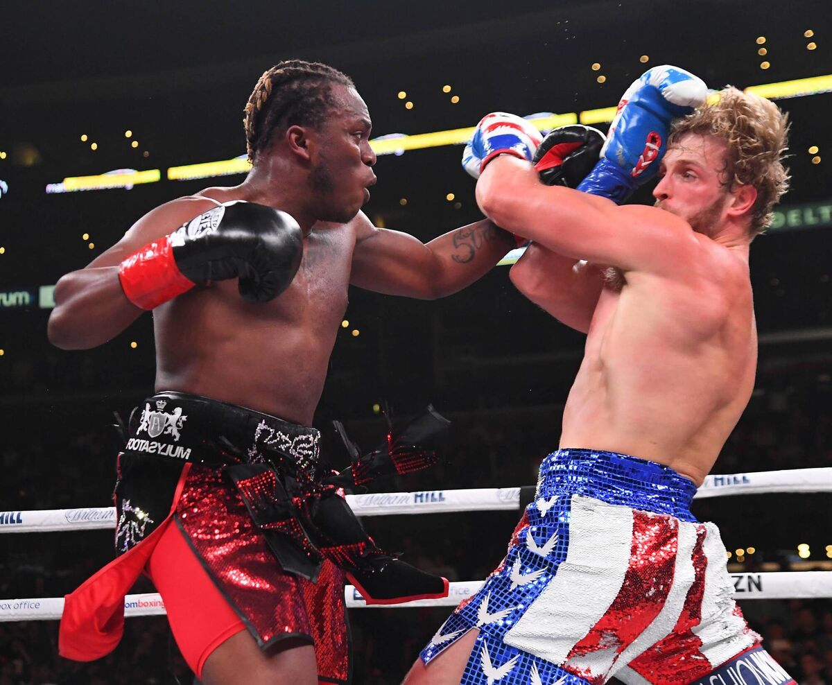 KSI and Logan Paul  exchange punches during their pro debut fight at Staples Center in Los Angeles in 2019.   (Picture: Jayne Kamin-Oncea/Getty)