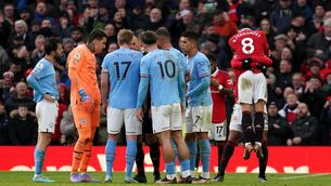 <p>COMPLAINTS: Manchester City players surrounded referee Stuart Atwell as United celebrated around them. Pic: Martin Rickett/PA</p>