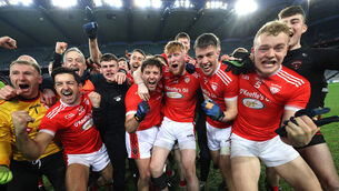 <p>REACHING THE SUMMIT: Rathmore's players celebrate after the game. Pic: ©INPHO/Bryan Keane</p>