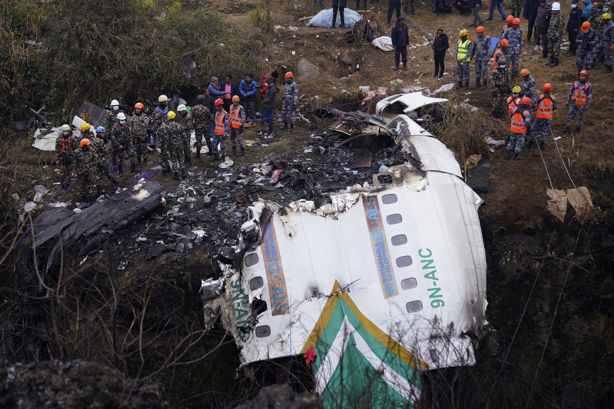 Day of mourning in Nepal after plane crash kills at least 68