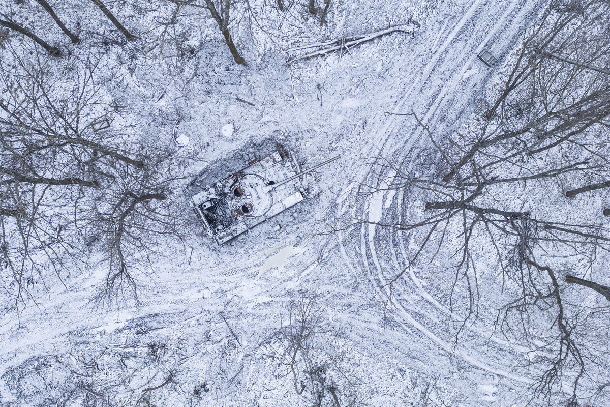 A destroyed Russian tank covered by snow stands in a forest in the Kharkiv region, Ukraine. Picture: AP Photo/Evgeniy Maloletka