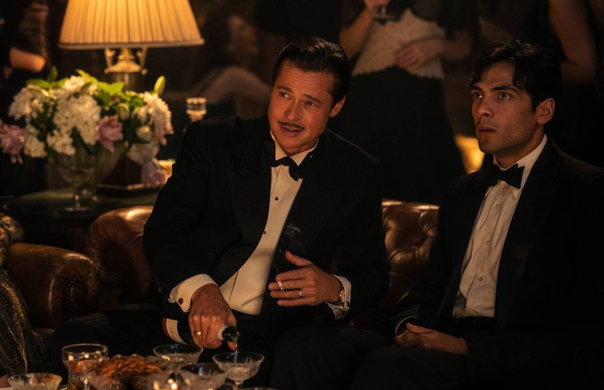 Brad Pitt plays Jack Conrad and Diego Calva plays Manny Torres in Babylon from Paramount Pictures. Brad Pitt plays Jack Conrad and Diego Calva plays Manny Torres in Babylon from Paramount Pictures.