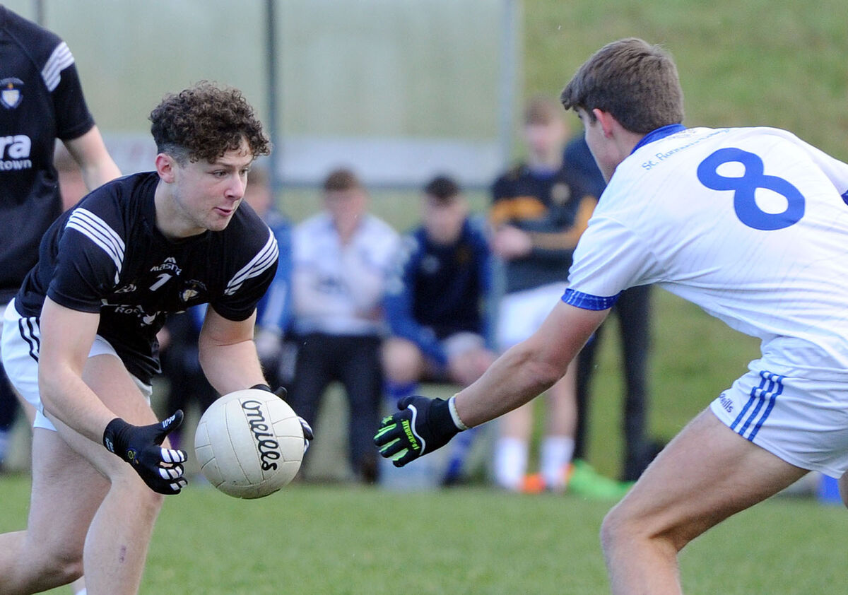 St. Francis College, Rochestown's Donnacha O'Callaghan looking for a way past James Hegarty of St. Flannan’s College in the Corn Uí Mhuirí at Mallow. St. Francis College, Rochestown's Donnacha O'Callaghan looking for a way past James Hegarty of St. Flannan’s College in the Corn Uí Mhuirí at Mallow.