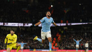 <p>BLUE MOON: Manchester City's Riyad Mahrez celebrates scoring their side's fourth goal against Tottenham. Picture: Martin Rickett/PA Wire</p>