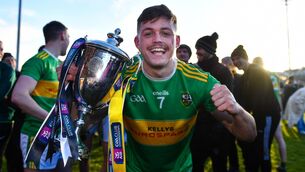 <p>HISTORY MAKERS: Eunan Mulholland of Glen with the cup after the AIB Ulster GAA Football Senior Club Championship Final. Pic: Ben McShane/Sportsfile</p>