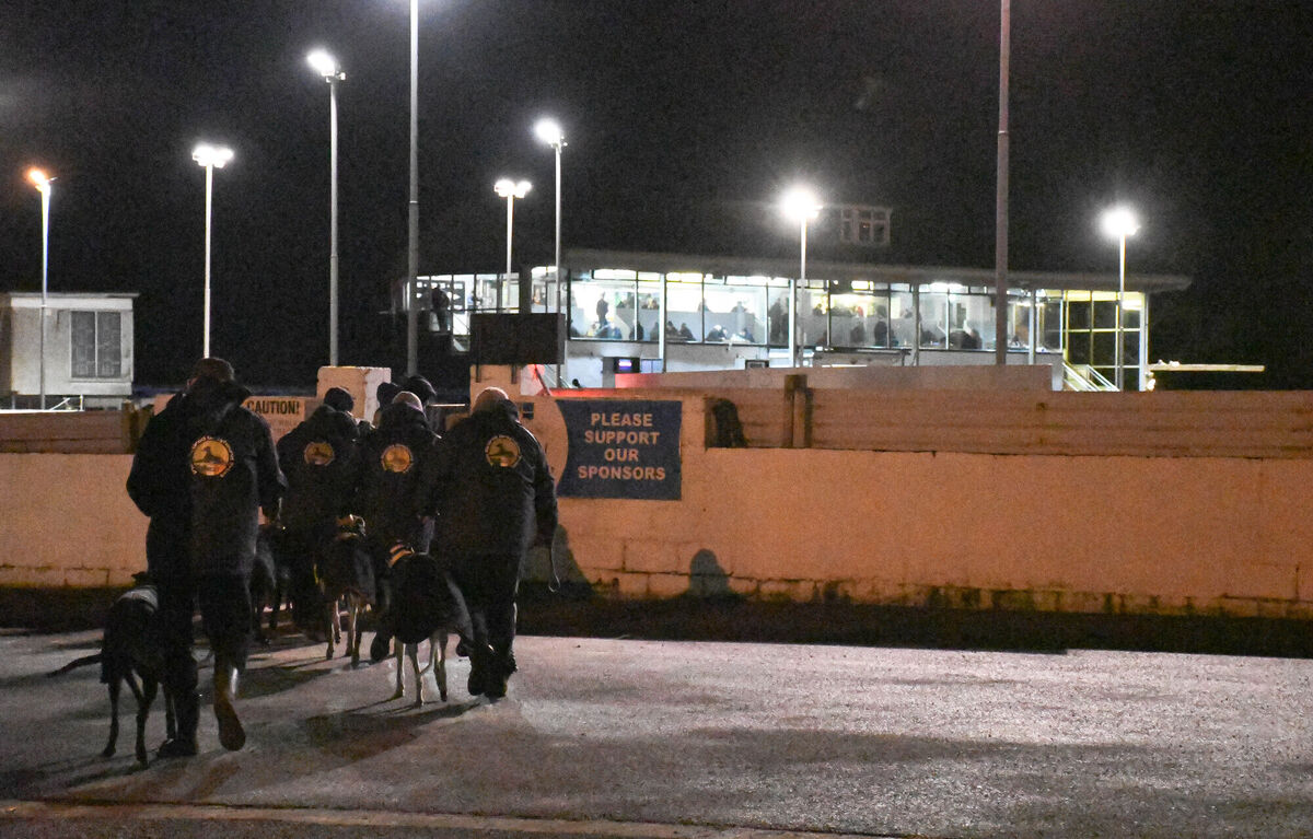 Trainers walking their dogs onto the track prior to the start of one of the races at a recent race night at Youghal Greyhound Stadium. Picture: Howard Crowdy Trainers walking their dogs onto the track prior to the start of one of the races at a recent race night at Youghal Greyhound Stadium. Picture: Howard Crowdy