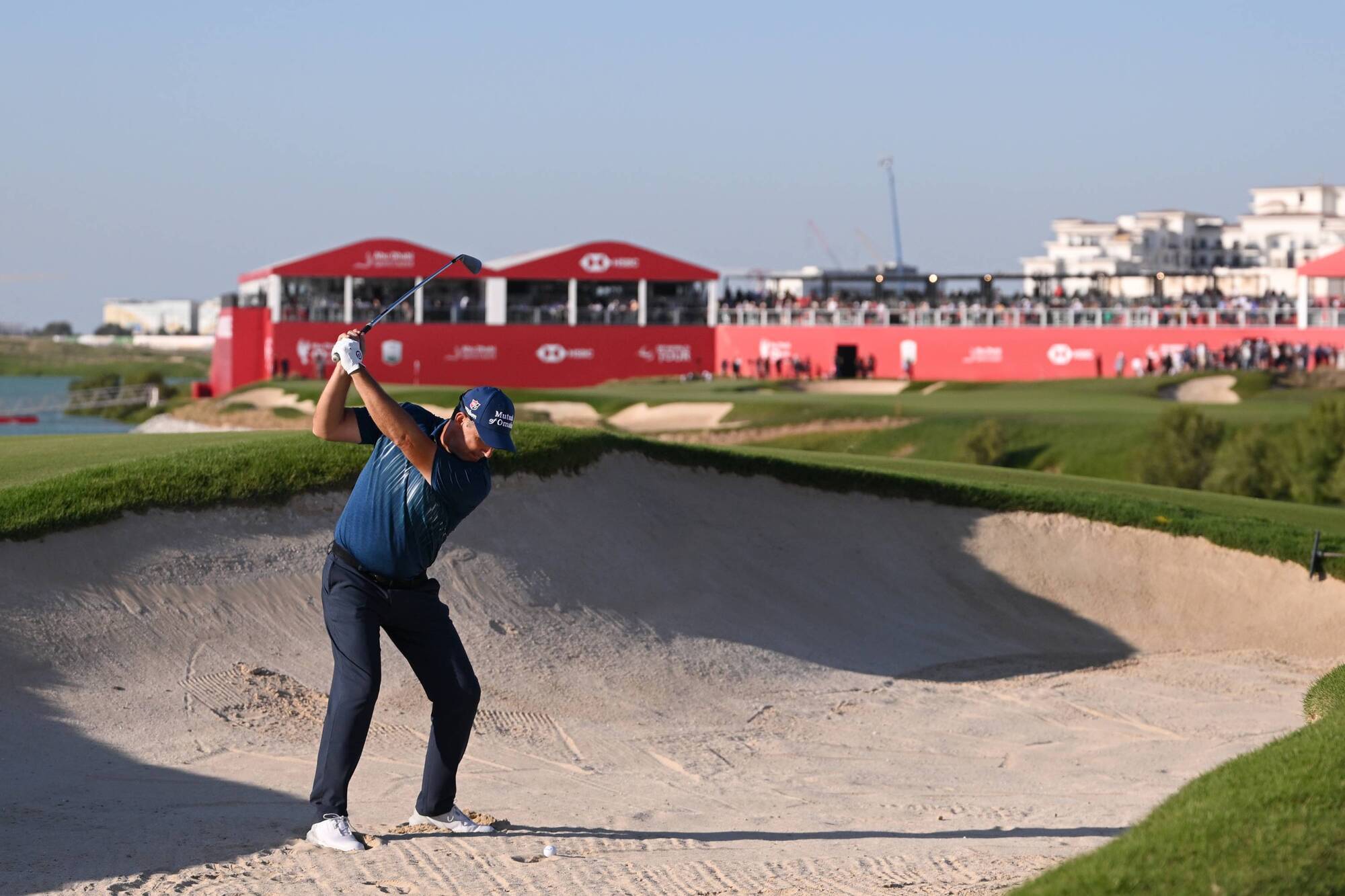Pádraig Harrington claims top four finish in Abu Dhabi as Lowry suffers late collapse