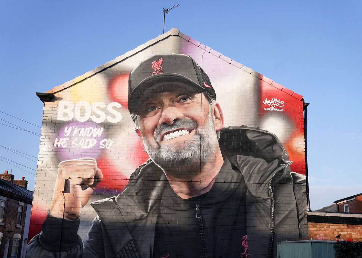 SAFE AS HOUSES: A mural of Liverpool manager Jurgen Klopp on a house near the ground ahead of the Premier League match at Anfield. Picture: Martin Rickett/PA Wire.