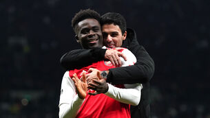 <p>FEELGOOD INC: Arsenal's Bukayo Saka celebrates with manager Mikel Arteta following victory over Man Utd. </p>