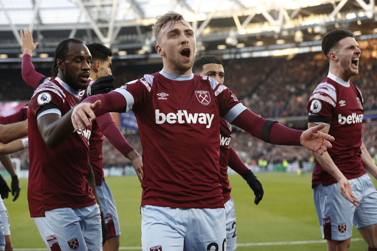 HAMMER TIME: West Ham's Jarrod Bowen, center, celebrates after scoring his side's opening goal during the English Premier League soccer match between West Ham United and Everton. PIC CREDIT: AP Photo/Steve Luciano.