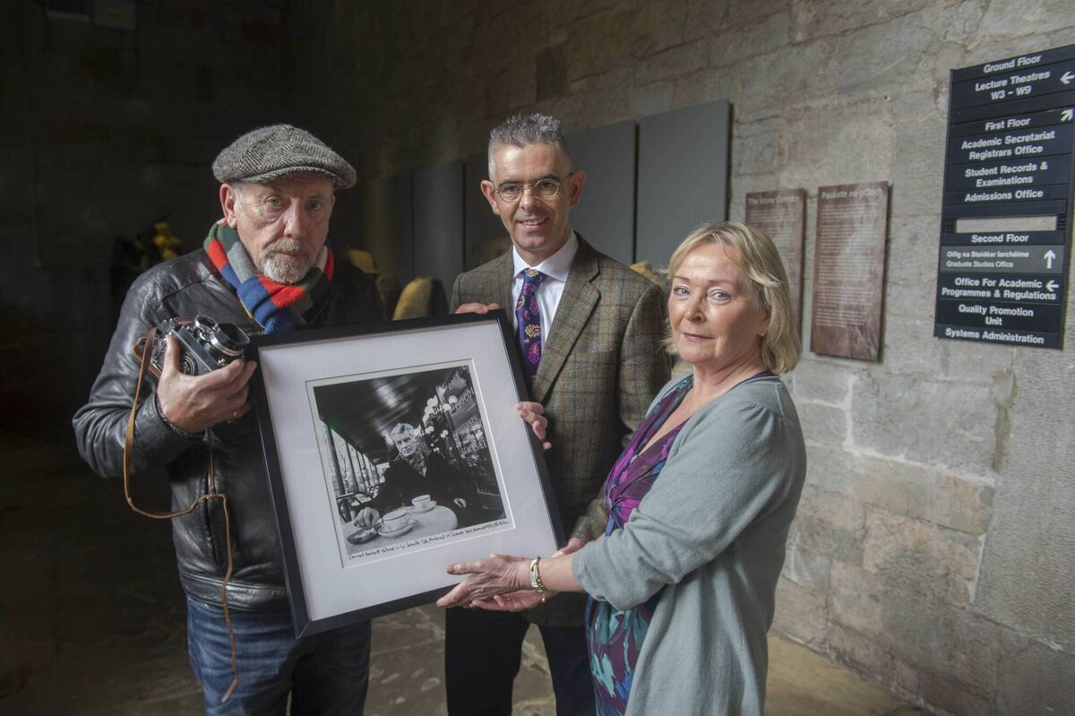 John Minihan holds one of his photos of Samuel Beckett, as his pictures were acquired by UCC Library. Also pictured are Crónán Ó Doibhlin and Colette McKenna of UCC Library. Picture: Michael Mac Sweeney/Provision John Minihan holds one of his photos of Samuel Beckett, as his pictures were acquired by UCC Library. Also pictured are Crónán Ó Doibhlin and Colette McKenna of UCC Library. Picture: Michael Mac Sweeney/Provision