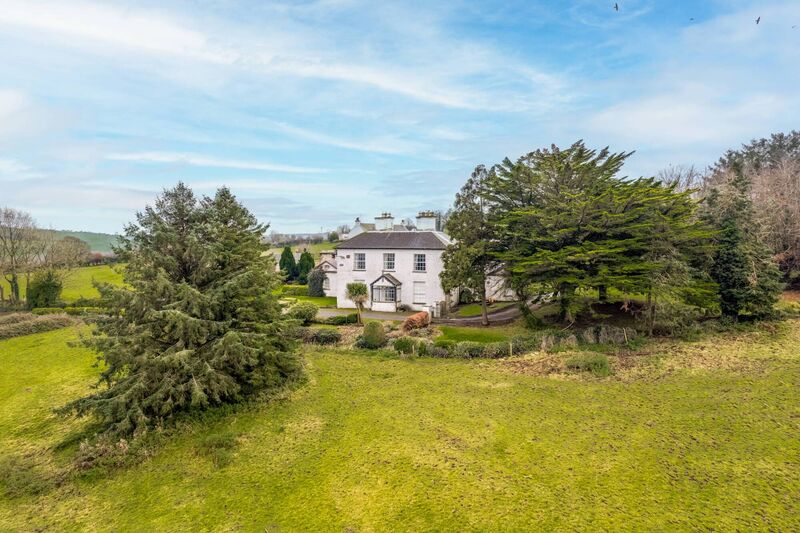 Castlewhite House is on 13 acres, in two paddocks, with views back to Cork city Castlewhite House is on 13 acres, in two paddocks, with views back to Cork city
