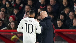 Manchester United manager Erik ten Hag embraces Marcus Rashford, left (Tim Goode/PA)