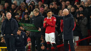 <p>ARM AROUND THE SHOULDER: Manchester United's Jadon Sancho with manager Erik ten Hag. Pic: Martin Rickett/PA Wire.</p>