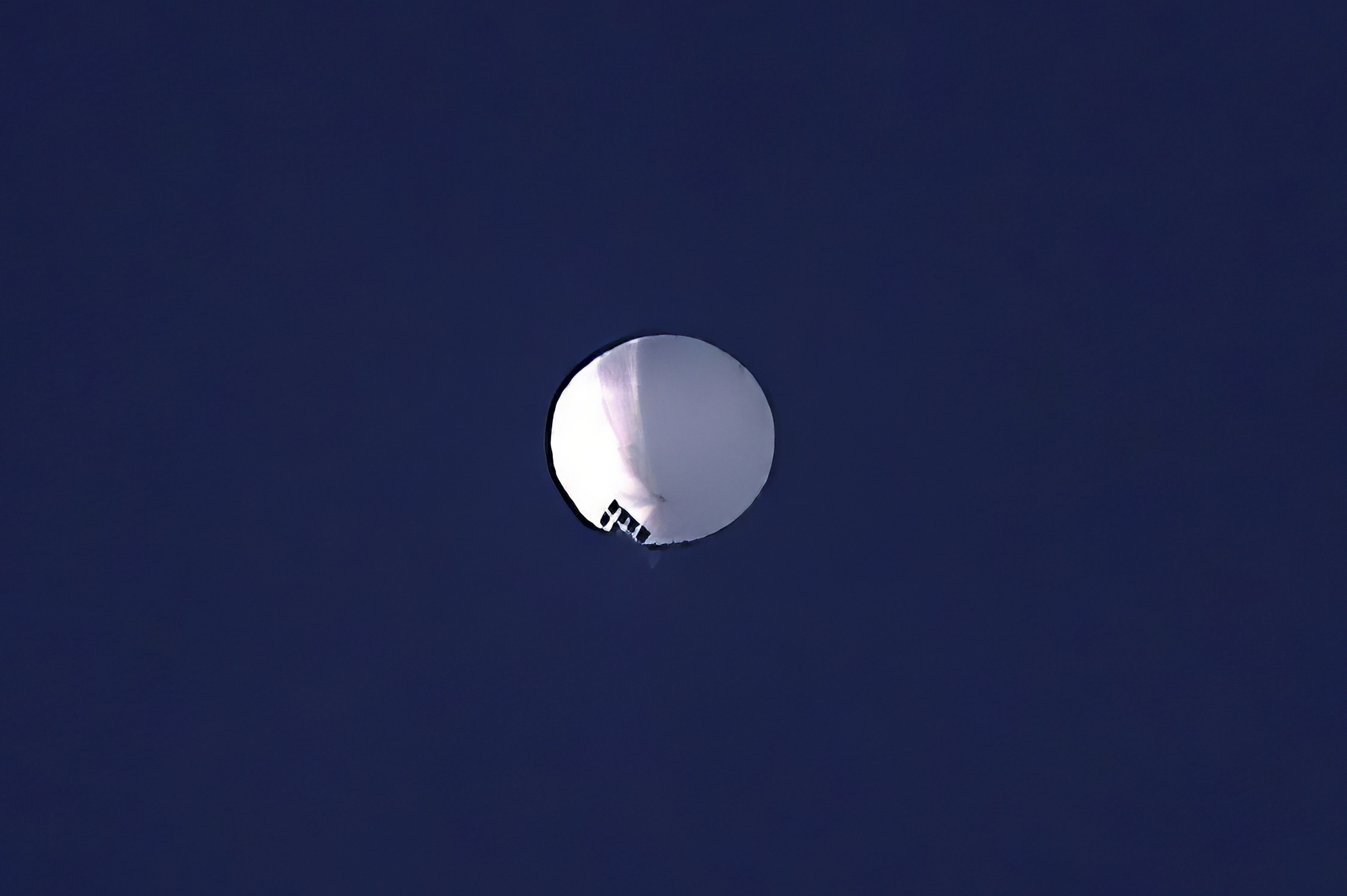 US downs Chinese balloon over ocean and moves to recover debris
