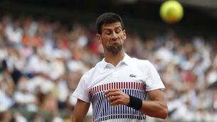 Novak Djokovic survives first big test in French Open