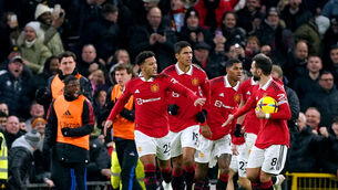 <p>RESCUE MISSION: Manchester United's Jadon Sancho celebrates with his team-mates. Pic: Martin Rickett/PA Wire.</p>