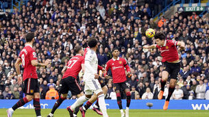 <p>UP AGAINST IT: Manchester United's Harry Maguire heads the ball clear. Pic: Danny Lawson/PA Wire.</p>