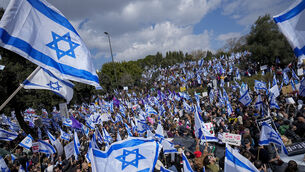 Israelis protest outside the Knesset against plans by Prime Minister Benjamin Netanyahu’s new government to overhaul the judicial system,(Ohad Zwigenberg/AP)