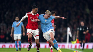 <p>MENTALITY MONSTERS: Manchester City's Erling Haaland and Arsenal’s William Saliba (left) battle for the ball. Pic: Adam Davy/PA Wire.</p>