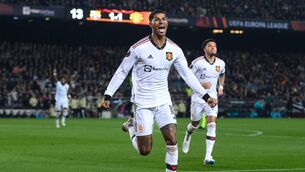 <p>GOAL: Marcus Rashford celebrates after his cross is turned into the Barcelona goal by their centre-back Jules Koundé.Pic: David Ramos/Getty Images</p>
