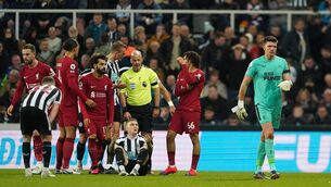 <p>RED MIST: Newcastle United goalkeeper Nick Pope (right) leaves the pitch after being being shown a red card during the Premier League match at St. James' Park. Pic: Owen Humphreys/PA Wire</p>
