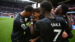 <p>CRUCIAL: Arsenal's Italian midfielder Jorginho (C) celebrates with teammates after his shot ends up in the net, rebounding off Aston Villa's Argentinian goalkeeper Emiliano Martinez for an own-goal. Pic: Geoff Caddick/AFP via Getty</p>