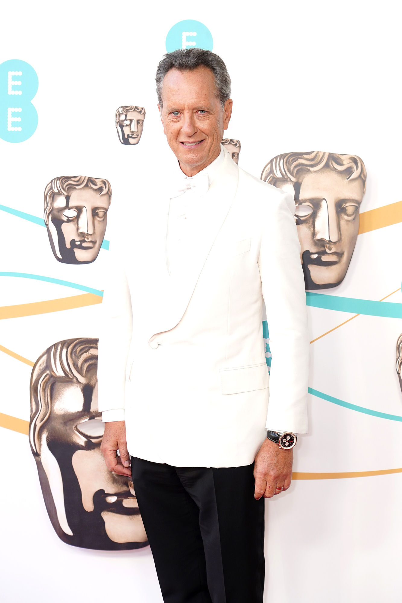Richard E Grant references Will Smith’s Oscars slap as he opens the Baftas