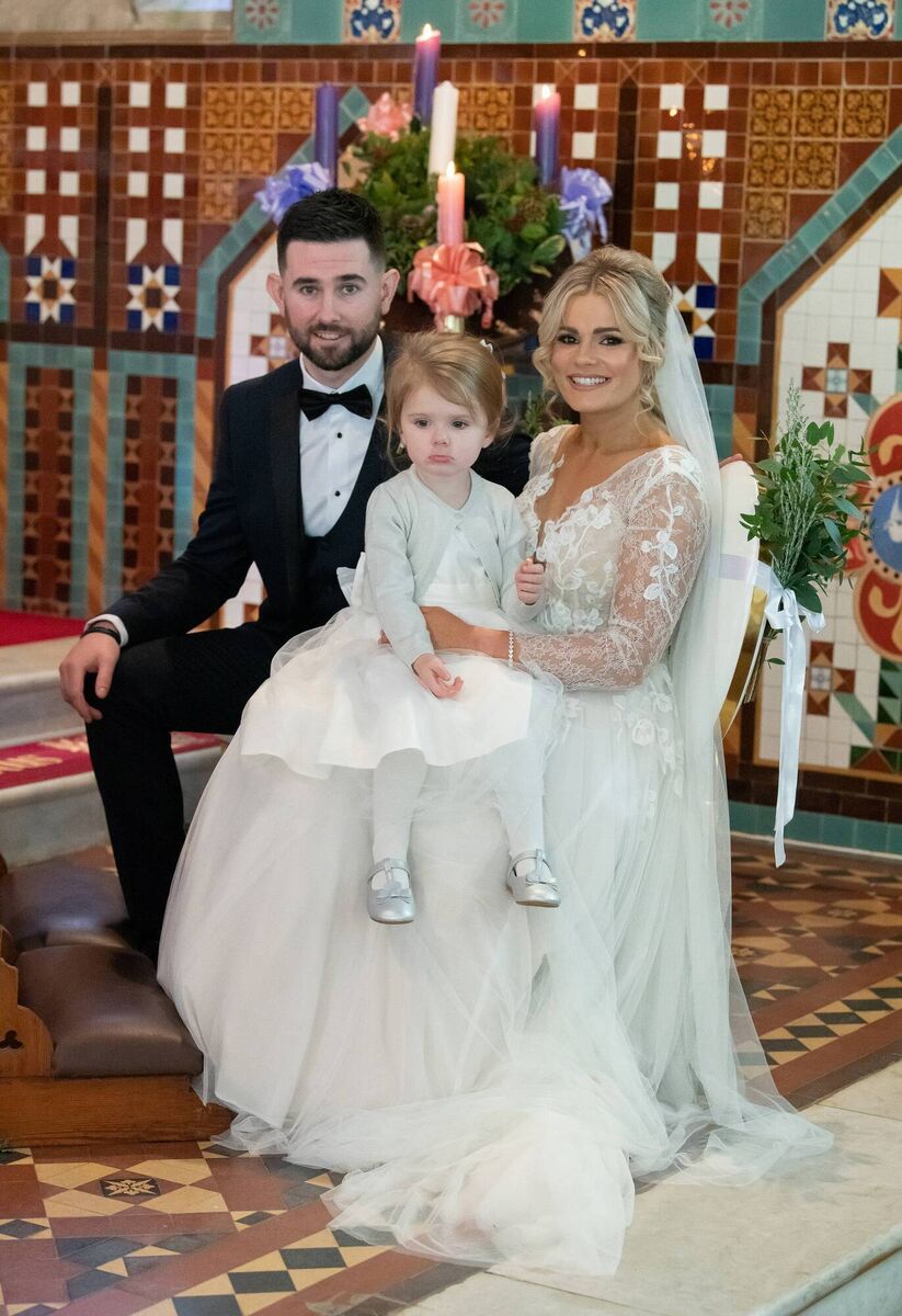 Orlaith St John and Dan Keane with their daughter Holly Keane.