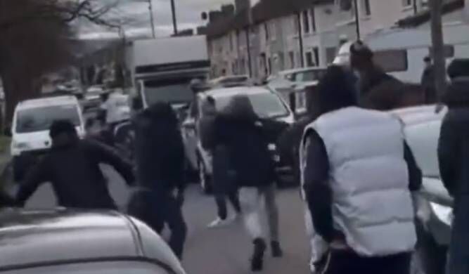 Footage shared on social media showed a large number of youths surrounding the garda officers. Picture: Twitter Footage shared on social media showed a large number of youths surrounding the garda officers. Picture: Twitter