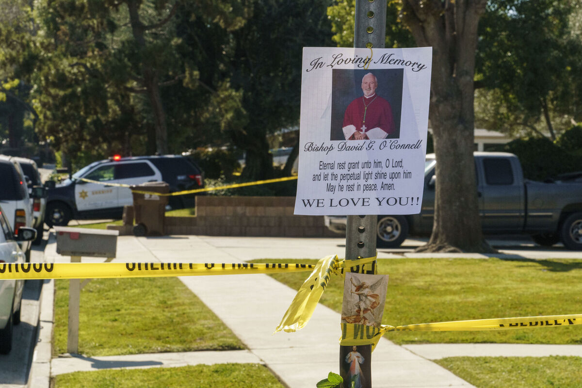 An image of Bishop David O'Connell is posted on the post of a street sign near his home in Hacienda Heights, California. Picture: AP Photo/Damian Dovarganes