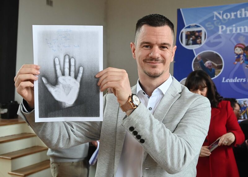 Gary Coughlan with a sketch of his hand which was among the memorabilia from a time capsule from 1995-1996. Gary Coughlan with a sketch of his hand which was among the memorabilia from a time capsule from 1995-1996.