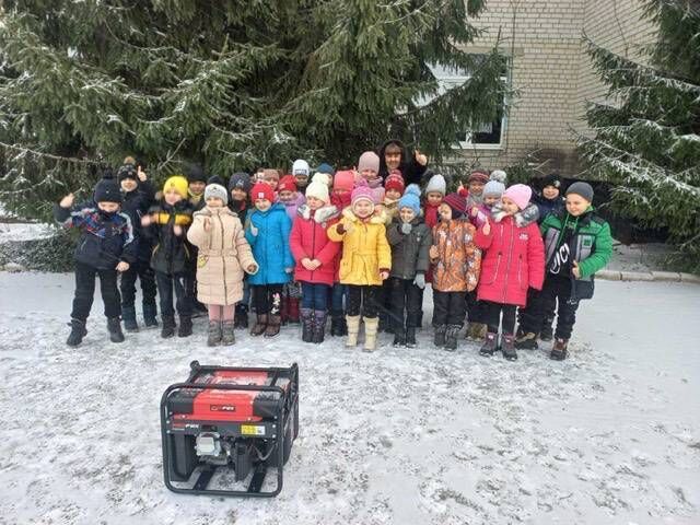 Children at school in Novyi Merchyk, which can stay open because of donation of generators from Ireland. Children at school in Novyi Merchyk, which can stay open because of donation of generators from Ireland.