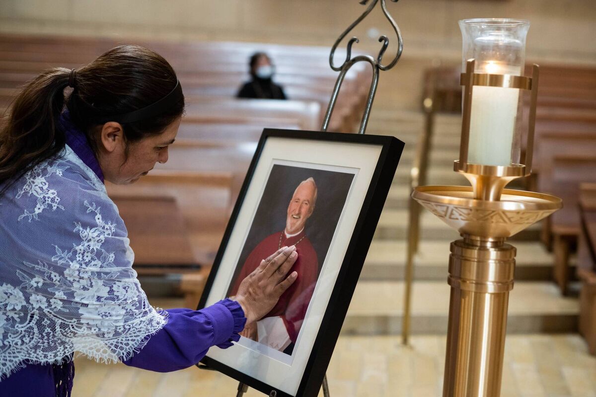 Alma Leticia Lopez prays over a picture of the late Bishop David O’Connell, who was murdered following Ash Wednesday Mass at the Cathedral of Our Lady of the Angels in Los Angeles on February 22, 2023. Picture: Sarah Reingewirtz/MediaNews Group/Los Angeles Daily News via Getty Images Alma Leticia Lopez prays over a picture of the late Bishop David O’Connell, who was murdered following Ash Wednesday Mass at the Cathedral of Our Lady of the Angels in Los Angeles on February 22, 2023. Picture: Sarah Reingewirtz/MediaNews Group/Los Angeles Daily News via Getty Images