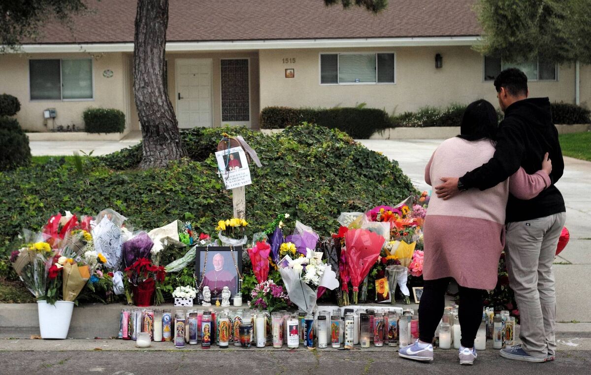 Maryann Torres with her son Mason of San Dimas pray for Bishop David O'Connell next to a makeshift memorial in front of his home in Hacienda Heights. O'Connell was shot and killed Saturday inside his home. Picture: Keith Birmingham/MediaNews Group/Pasadena Star-News via Getty Images Maryann Torres with her son Mason of San Dimas pray for Bishop David O'Connell next to a makeshift memorial in front of his home in Hacienda Heights. O'Connell was shot and killed Saturday inside his home. Picture: Keith Birmingham/MediaNews Group/Pasadena Star-News via Getty Images