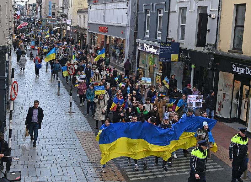 The march in Cork to mark the first anniversary of the Russian invasion of Ukraine proceeding along Oliver Plunkett St. Picture: Eddie O'Hare