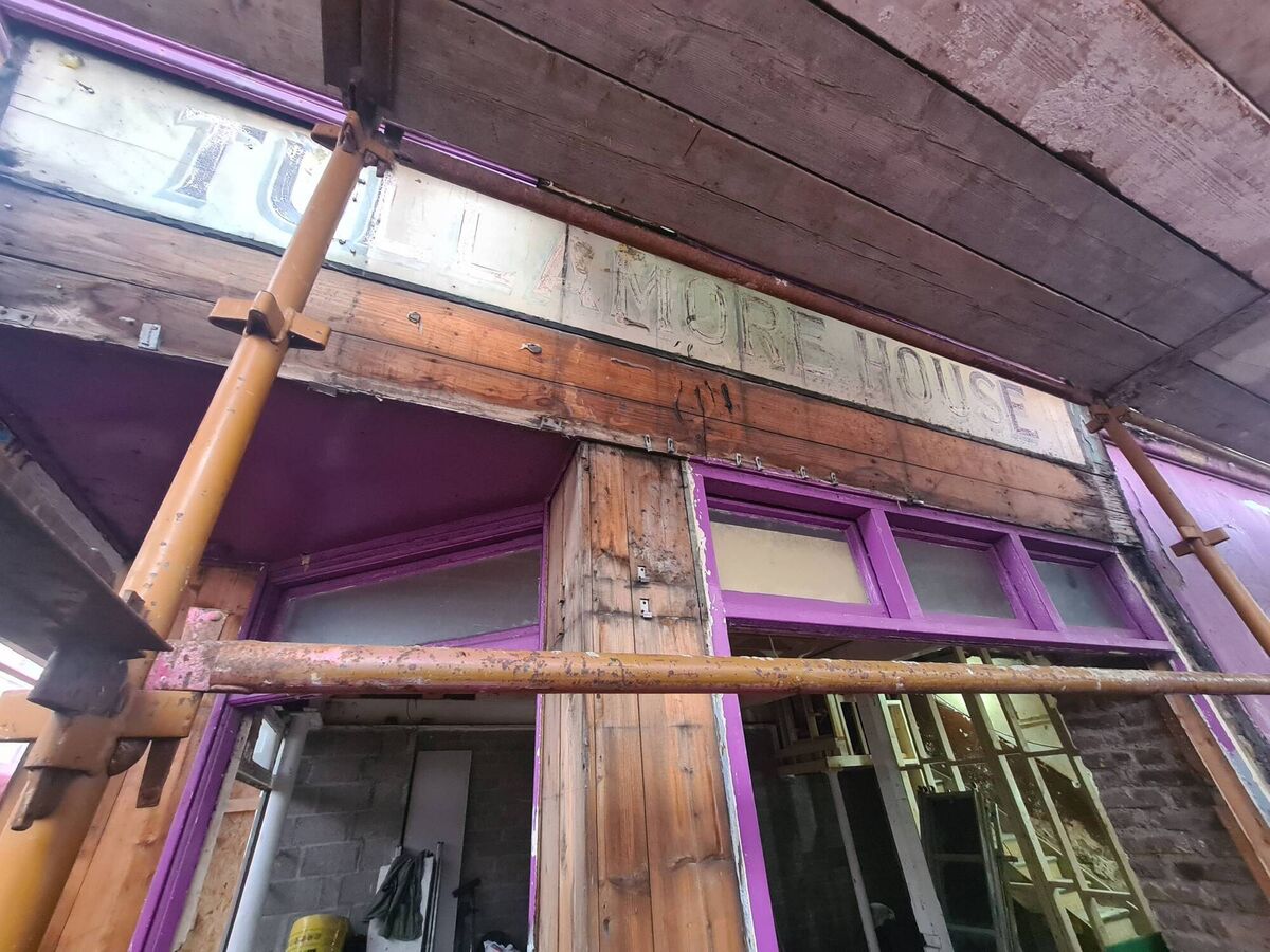 Old Tullamore Stores signage found under the glass on  Princes Street side