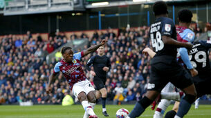 <p>Burnley's Michael Obafemi scores their side's fourth goal of the game during the Sky Bet Championship match at Turf Moor. Picture: Will Matthews/PA Wire.</p>