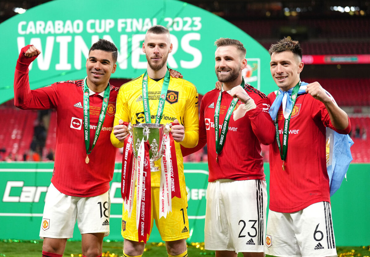 WINNERS: Manchester United's (left-right) Carlos Casemiro, David de Gea, Luke Shaw and Lisandro Martinez pose with the trophy after the Carabao Cup Final match at Wembley Stadium, London. Picture date: Sunday February 26, 2023. PA Photo. See PA story SOCCER Final. Photo credit should read: John Walton/PA Wire.