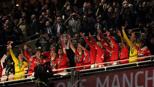 <p>CHAMPIONS: Manchester United lift the trophy after winning the Carabao Cup Final. Pic: John Walton/PA Wire.</p>